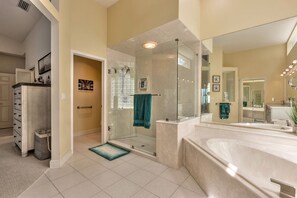 Bathtub, hair dryer, towels, soap