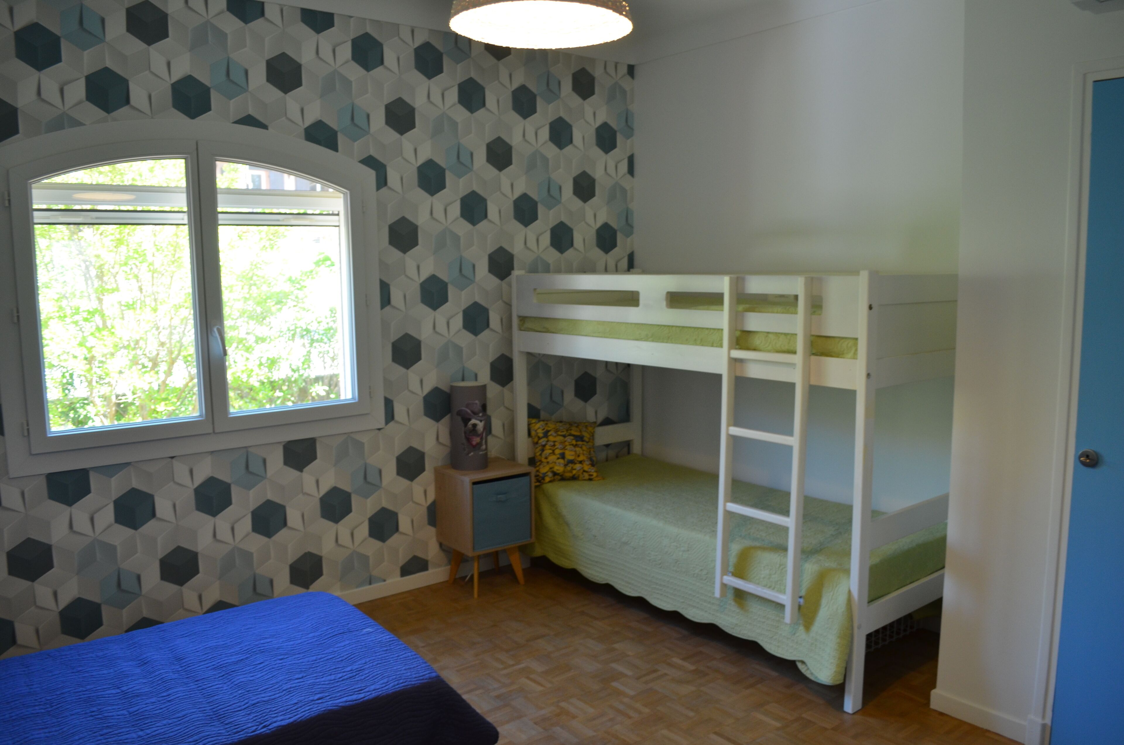 La chambre enfant climatisée avec lits superposés