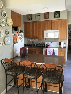 Fridge, microwave, coffee/tea maker, electric kettle