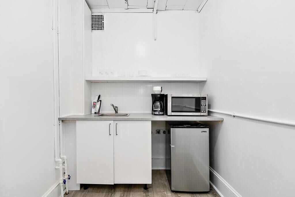 Microwave, stovetop, coffee/tea maker, electric kettle