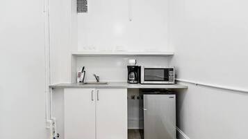 Microwave, stovetop, coffee/tea maker, electric kettle