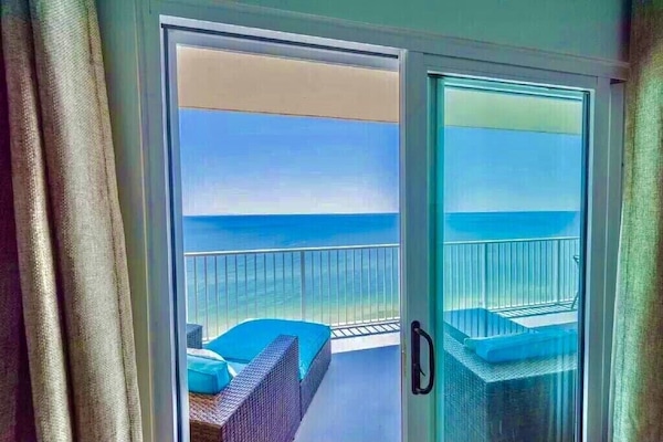Step out of the master on to your private balcony and listen to the waves.
