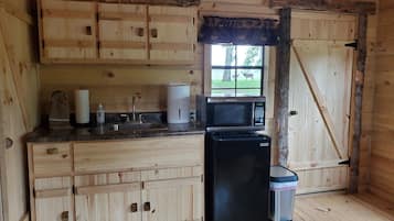 Fridge, microwave, cookware/dishes/utensils, dining tables