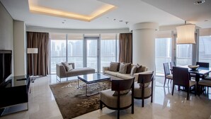 Apartment (2 Bedrooms) | Living area | 43-inch Smart TV with cable channels, TV, pay movies