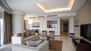 Apartment (2 Bedrooms) | Living room | 43-inch Smart TV with cable channels, TV, pay movies