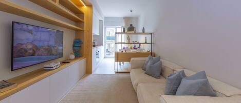Family Apartment, Multiple Bedrooms (Mina Apartment 100m From Sea) | Living area | 21-inch TV with digital channels