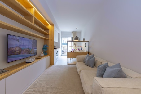 Family Apartment, Multiple Bedrooms (Mina Apartment 100m From Sea) | Living area | 21-inch TV with digital channels