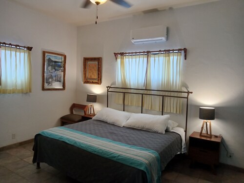 Room #6 Master with one king size bed, one double bed & one double bunk bed