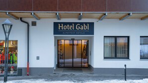 Hotel Gabl with a modern facade, large glass entrance, and a visible sign for ALPEFFECT HOTELS. - Hotel Gabl by Alpeffect Hotels (Sankt Anton am Arlberg)