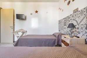 2 slaapkamers, een strijkplank/strijkijzer