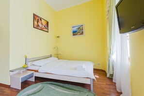 1 habitación, tabla de planchar con plancha, wifi gratis y ropa de cama 
