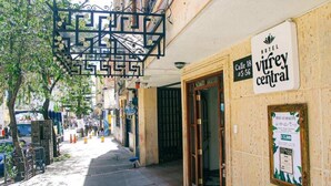 A hotel entrance with a sign for 'Virrey Central' and a 'Hotel' sign above it. - Ayenda 1066 Virrey Centro (Bogotá)
