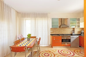 Villa | Private kitchen | Full-size fridge, microwave, oven, stovetop