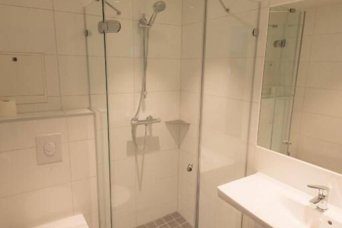 family room | bathroom | shower, hair dryer, heated floors, towels
