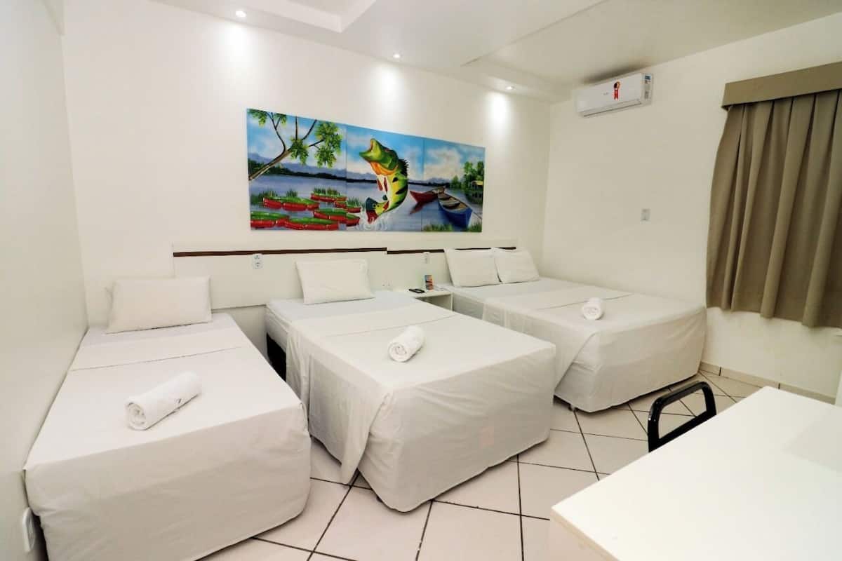 standard triple room | 1 bedroom, minibar, in-room safe, laptop workspace