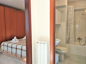Combined shower/tub, hair dryer