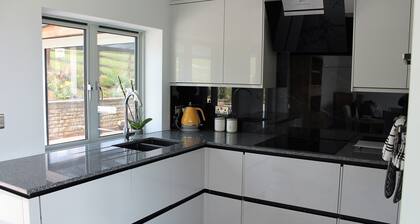 Newly converted pigsty with amazing views. One small dog welcome.