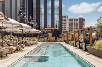 Outdoor pool, open 7:00 AM to 7:00 PM, cabanas (surcharge), sun loungers at Thompson Austin, by Hyatt