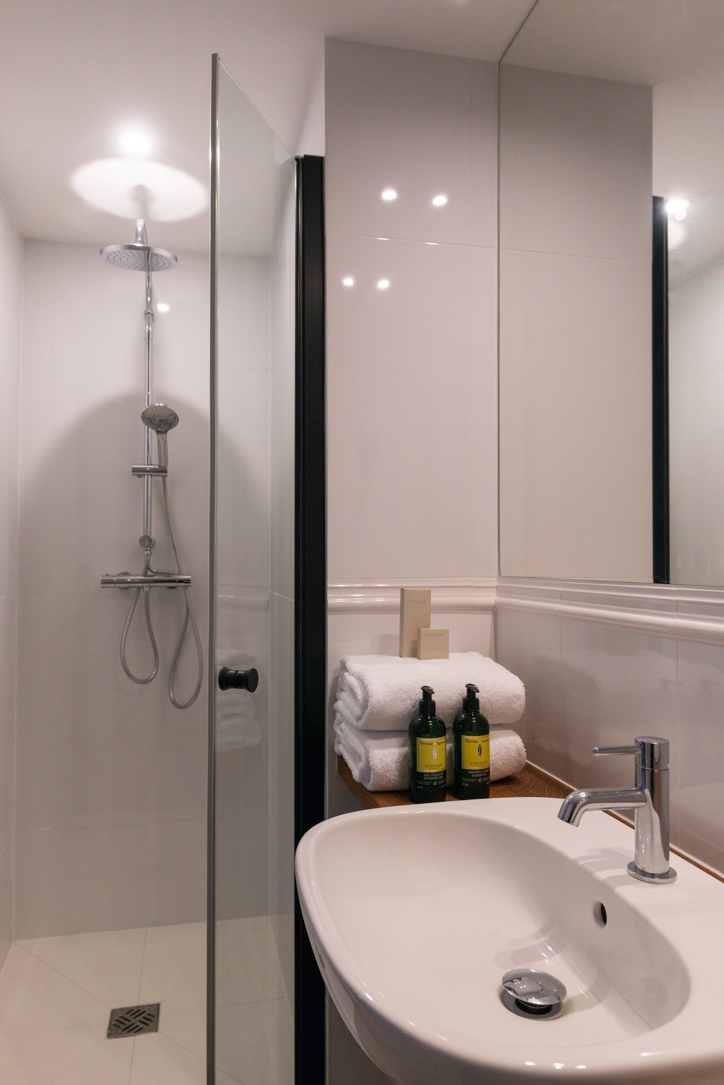 standard double room | bathroom | shower, rainfall showerhead, designer toiletries, hair dryer