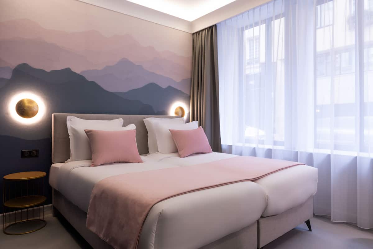 Superior Twin kamer | Luxe beddengoed, pillowtop-bedden, een minibar, een kluis op de kamer