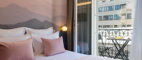 Premium bedding, pillow-top beds, minibar, in-room safe