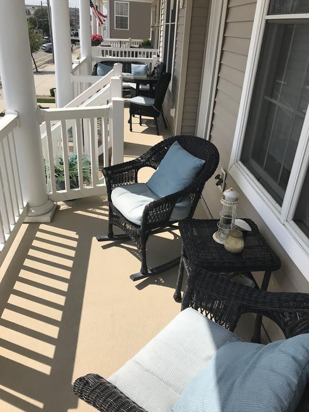 Balcony seating faces the sunset, perfect to unwind after beach/boardwalk time!