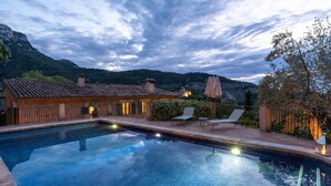 A swimming pool with a tiled deck, lounge chairs, and a view of mountains. - TRADITIONAL  HOUSE. IDEAL FOR FAMILY. PRIVATE  POOL. WIFI WITH FIBER. A/C (Deià)