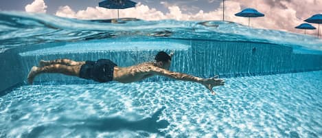 2 outdoor pools, open 8:00 AM to 10:00 PM, pool umbrellas, sun loungers