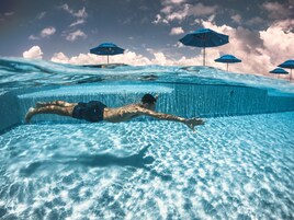 2 outdoor pools, open 8:00 AM to 10:00 PM, pool umbrellas, sun loungers