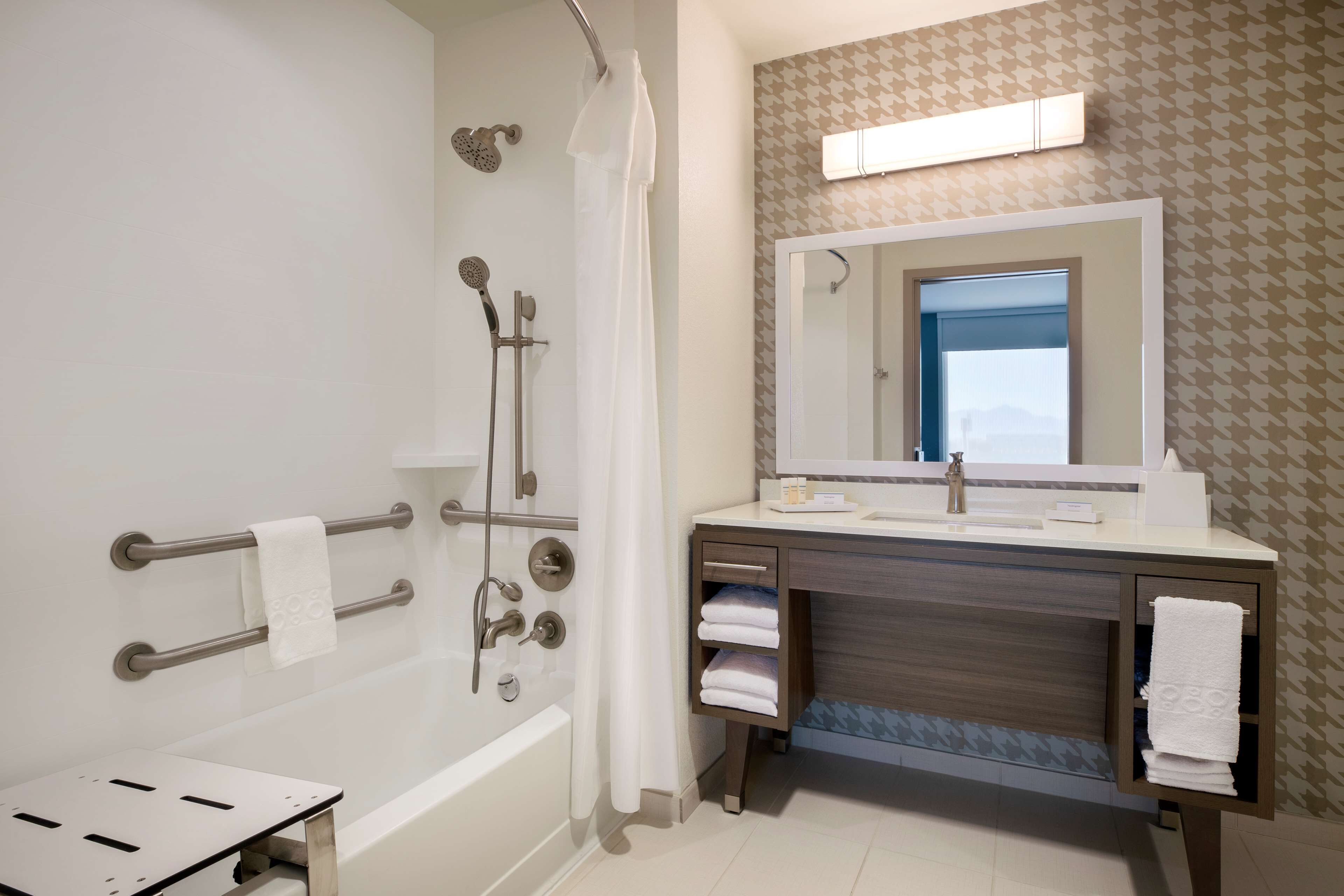 hair dryer, towels, soap, shampoo