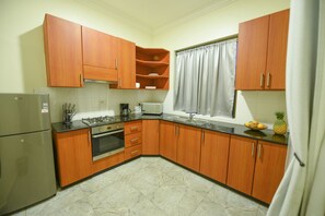 Apartment, Multiple Beds | Private kitchen
