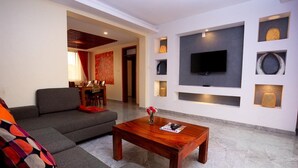 Living room - Deluxe 1- Bedroom Apartment With Swimming Pool (Kampala)