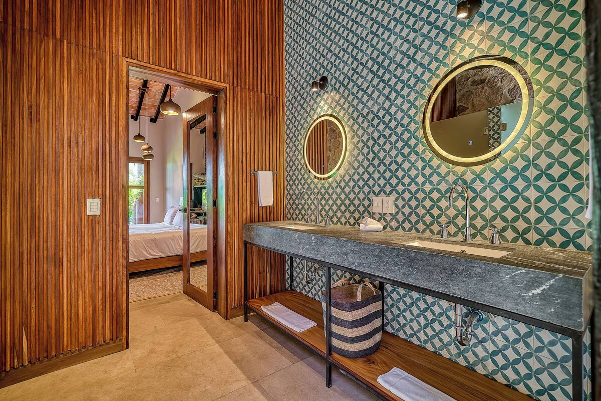 master suite (1) | bathroom | hair dryer, bathrobes, towels, soap