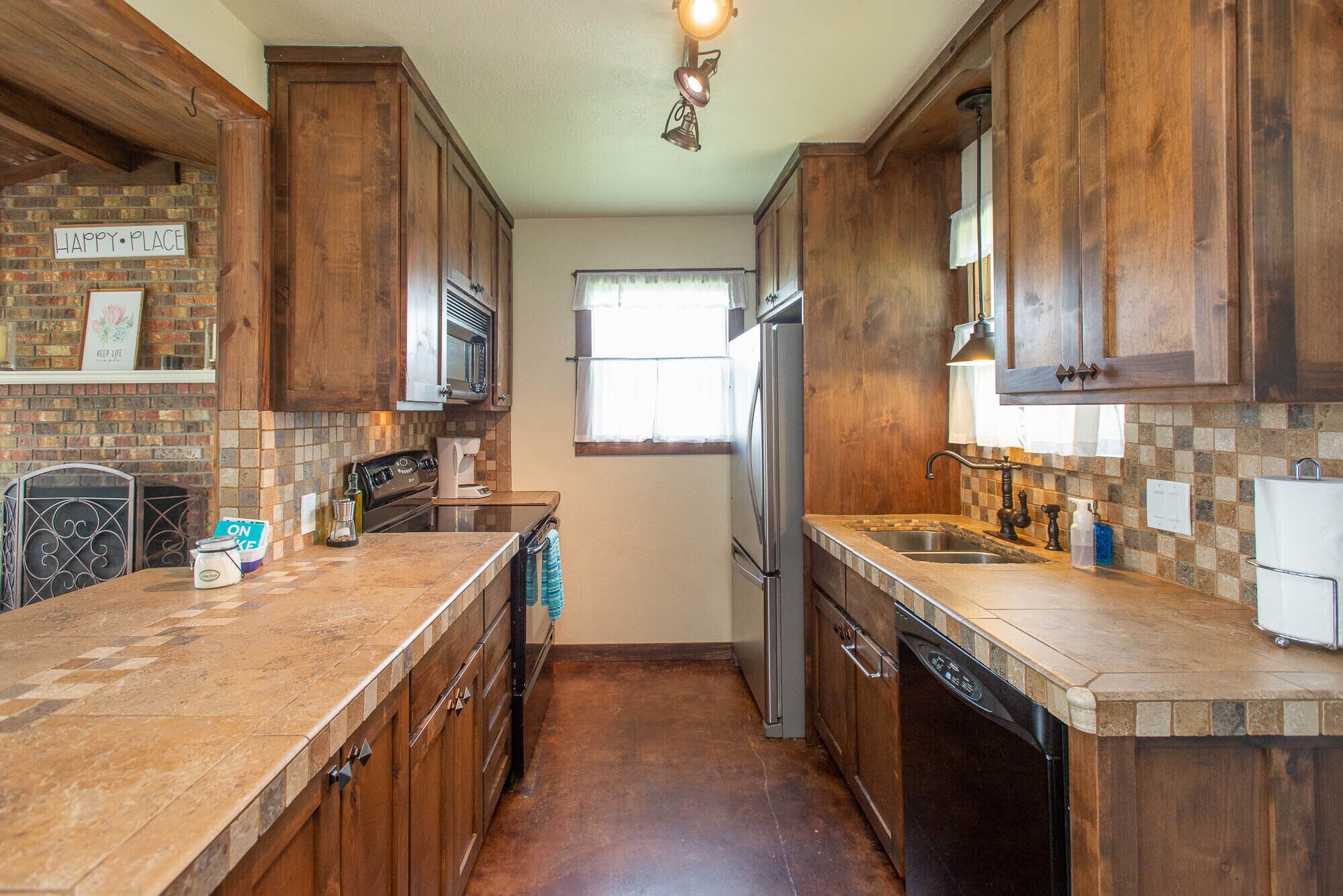 Beautiful lakefront home with open water view, boat house, firepit and more!