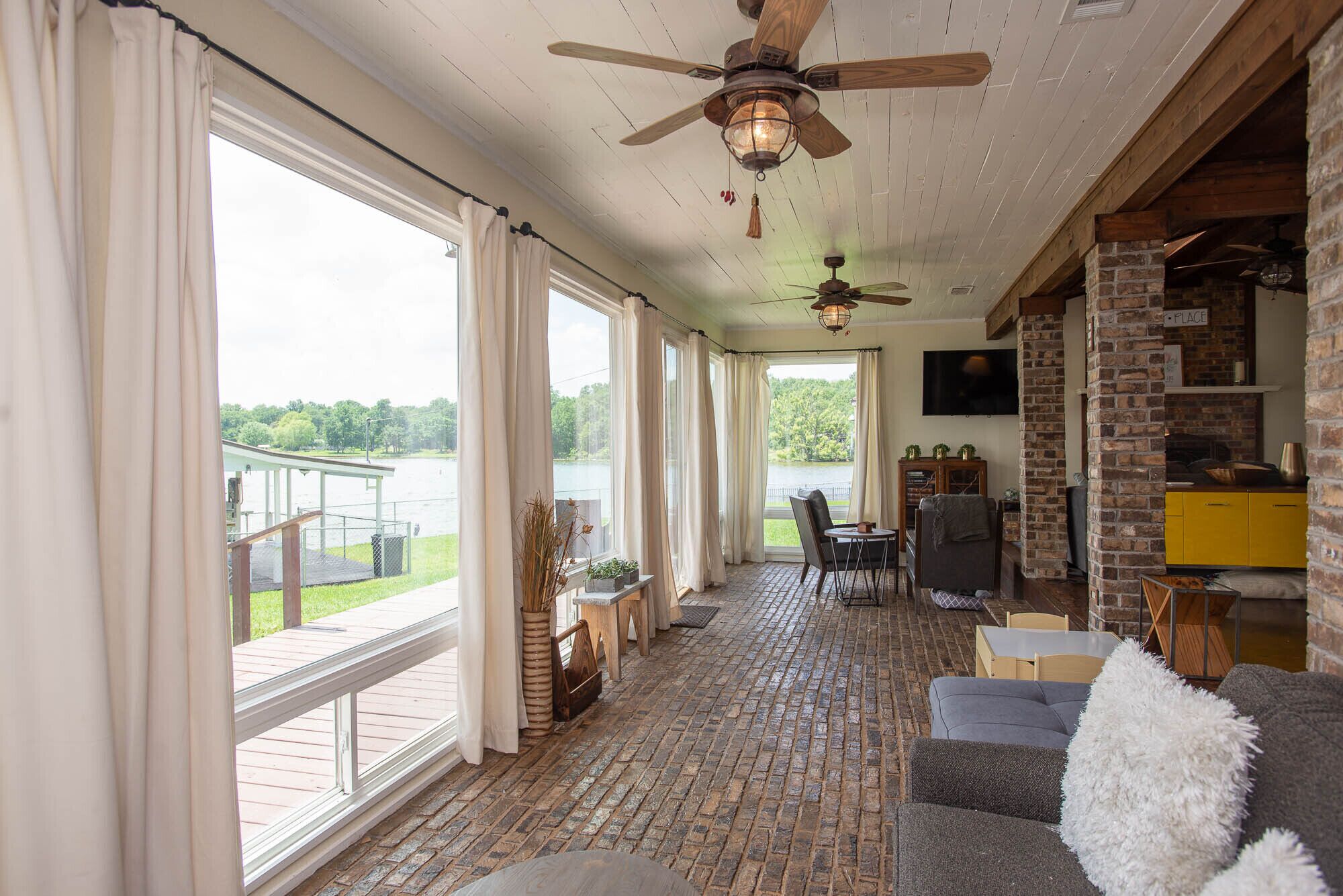 Beautiful lakefront home with open water view, boat house, firepit and more!