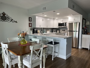 Fridge, microwave, oven, stovetop - Lovely renovated condo with water views, great value for outstanding amenities (Clearwater Beach)