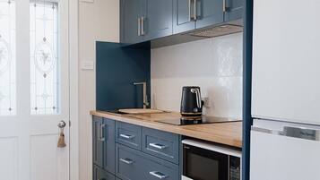 Fridge, microwave, electric kettle, toaster