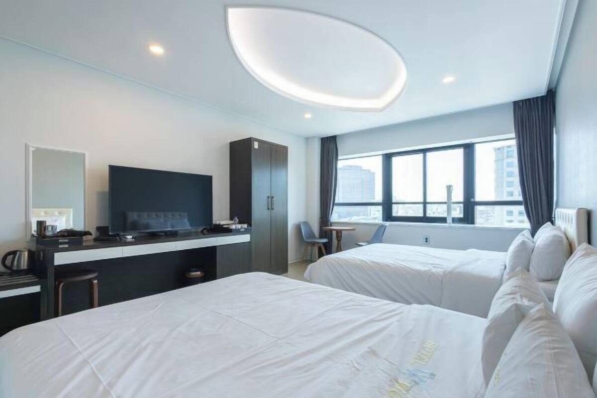 Premium bedding, Select Comfort beds, blackout drapes, soundproofing