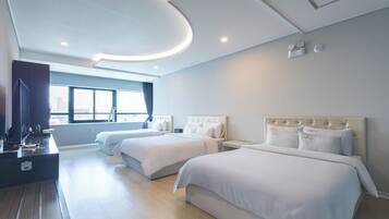 Deluxe Triple Room | Premium bedding, Select Comfort beds, blackout drapes, soundproofing