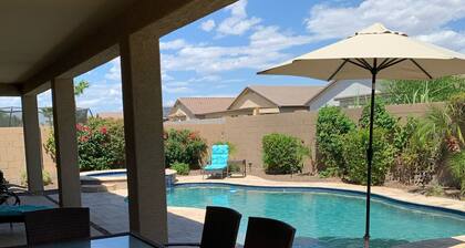 Great family friendly home very private back yard, heated pool & covered patio.