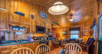 Niboban Cabin 5 right on Rangeley Lake with a screened porch, fire pit, hammock, WiFi and dock!