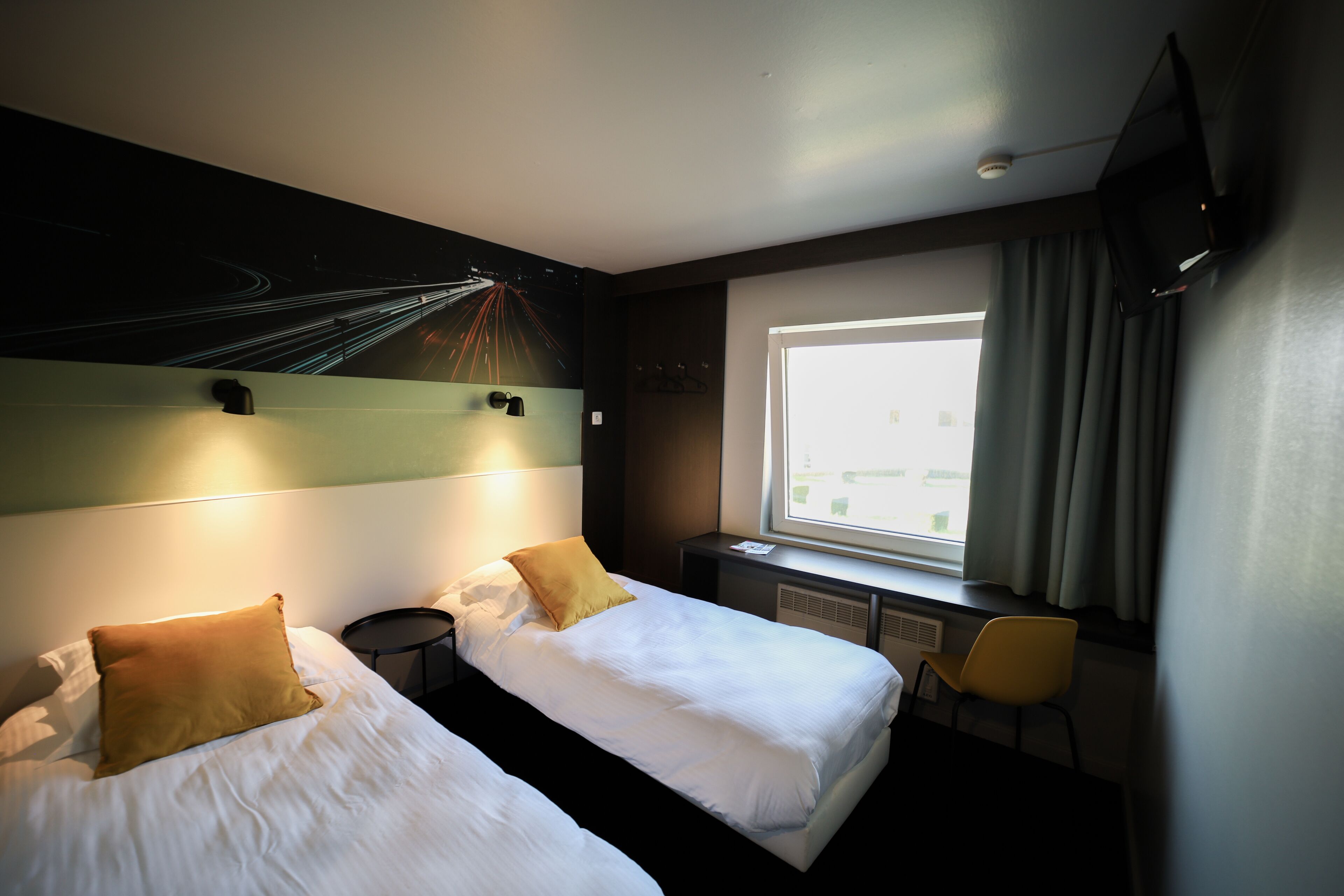 comfort twin room | desk, laptop workspace, blackout curtains, soundproofing