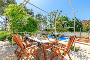 Outdoor dining - Exclusive Pool Escape Near Sea (Krk)