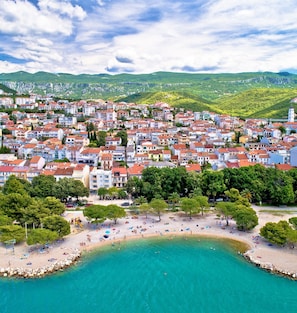A coastal town with a beach area and residential buildings. - Studio Paula 2 300m From Sea (Crikvenica)