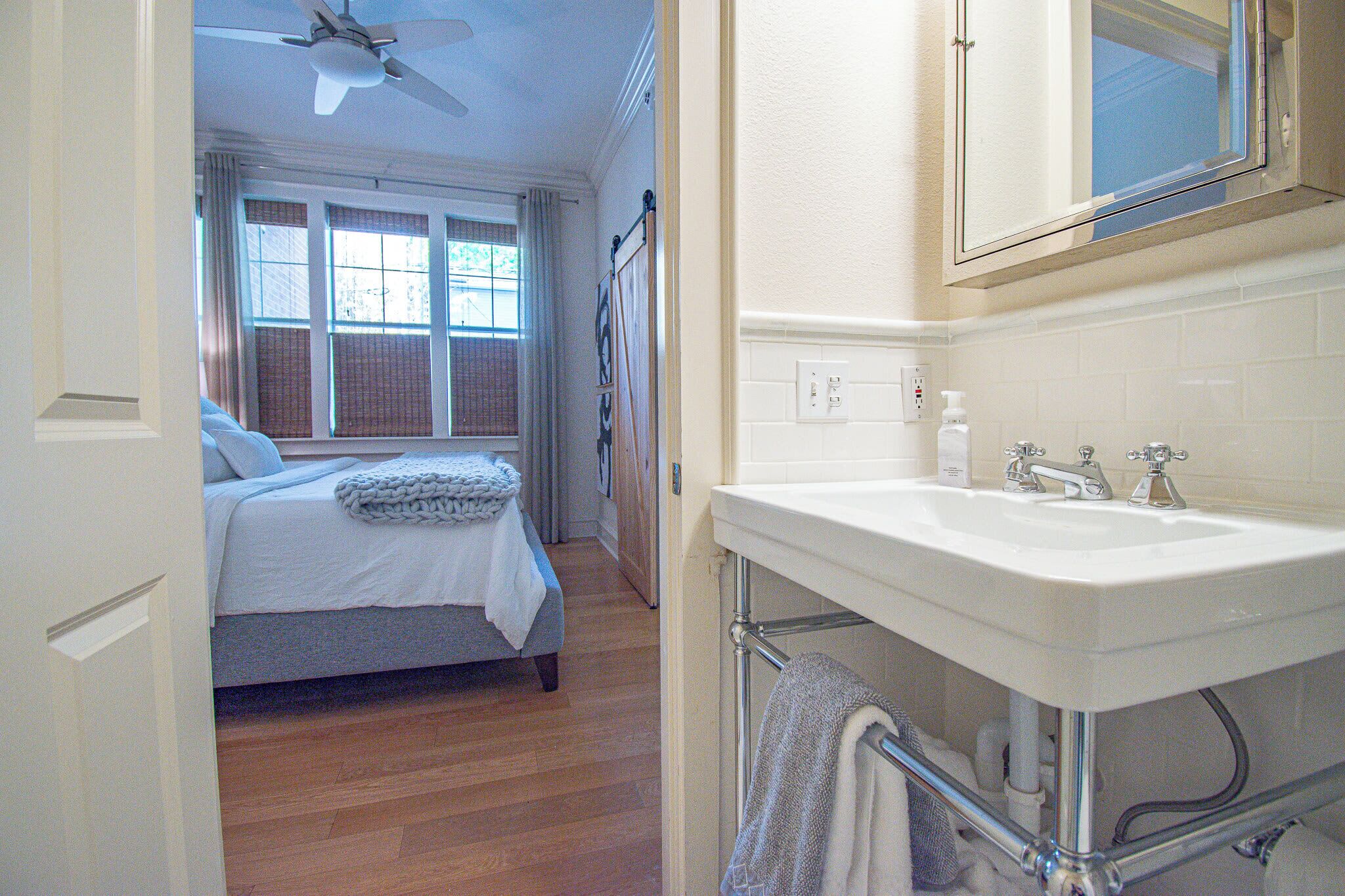 Bathtub, hair dryer, towels, shampoo