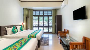 Premium family room | Individually furnished, desk, blackout curtains, iron/ironing board