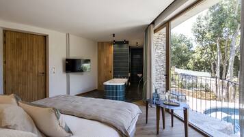 Premium bedding, memory foam beds, minibar, in-room safe