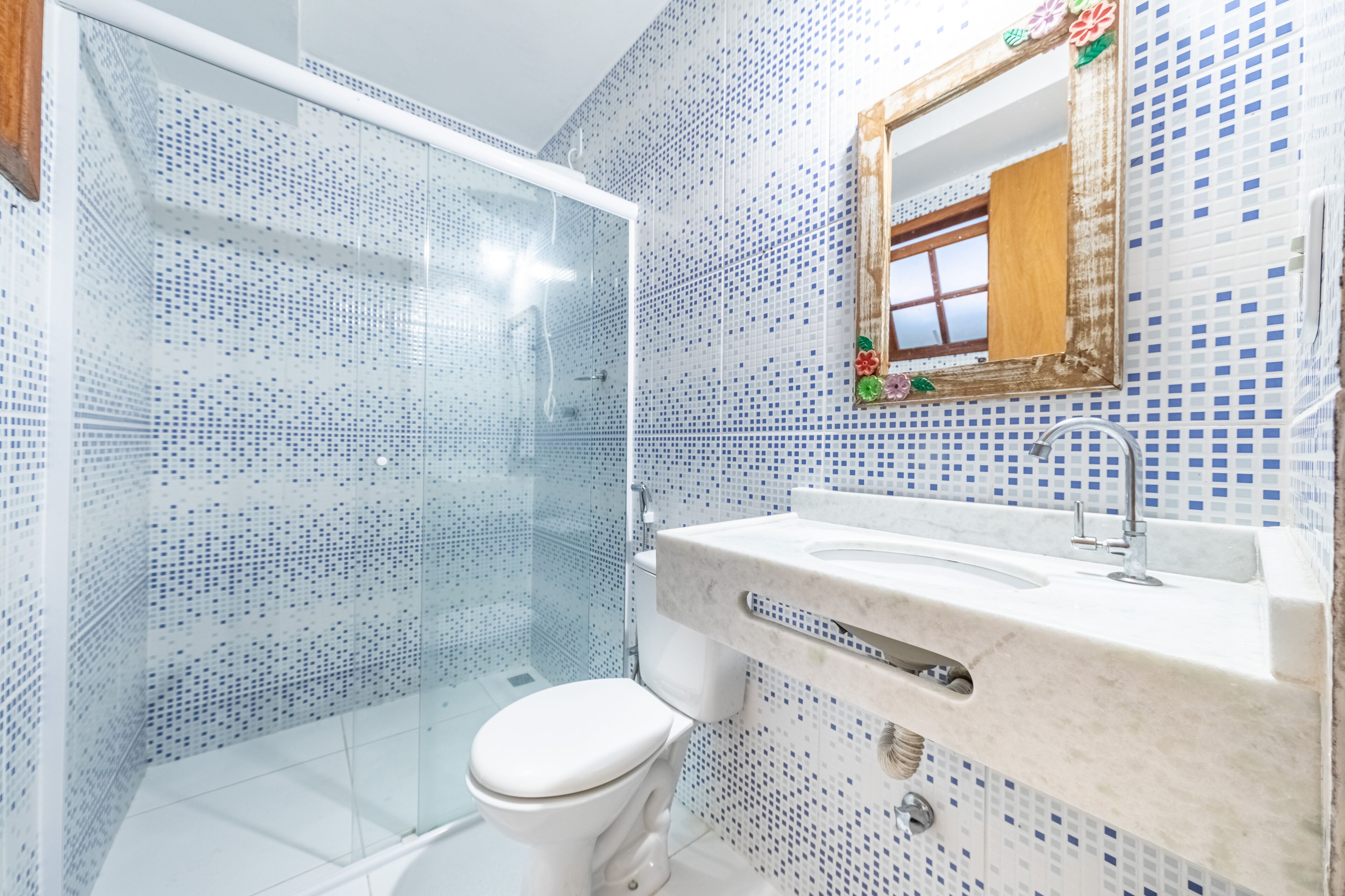 economy twin room | bathroom | shower, towels, soap, toilet paper