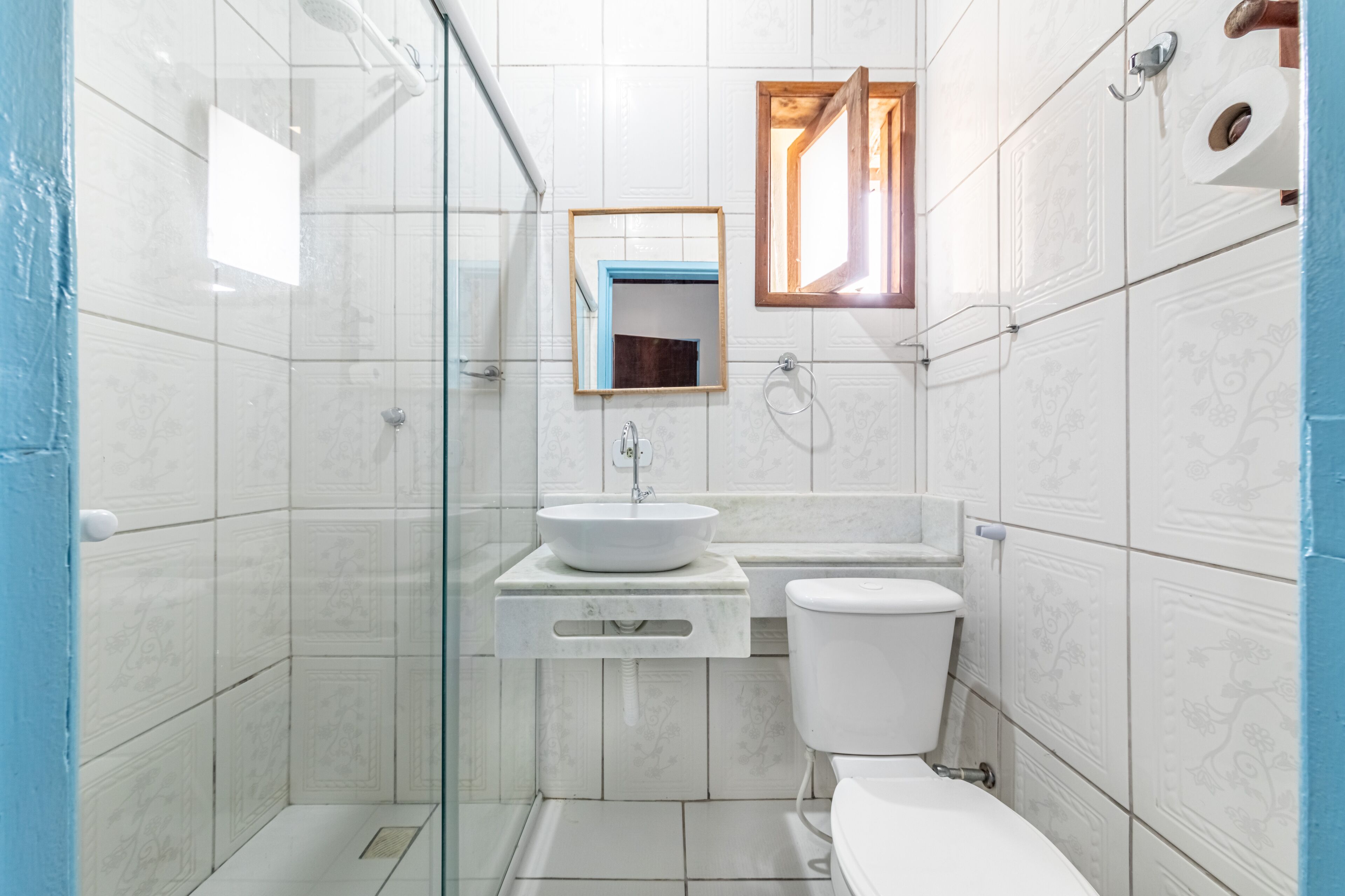 economy quadruple room | bathroom | shower, towels, soap, toilet paper