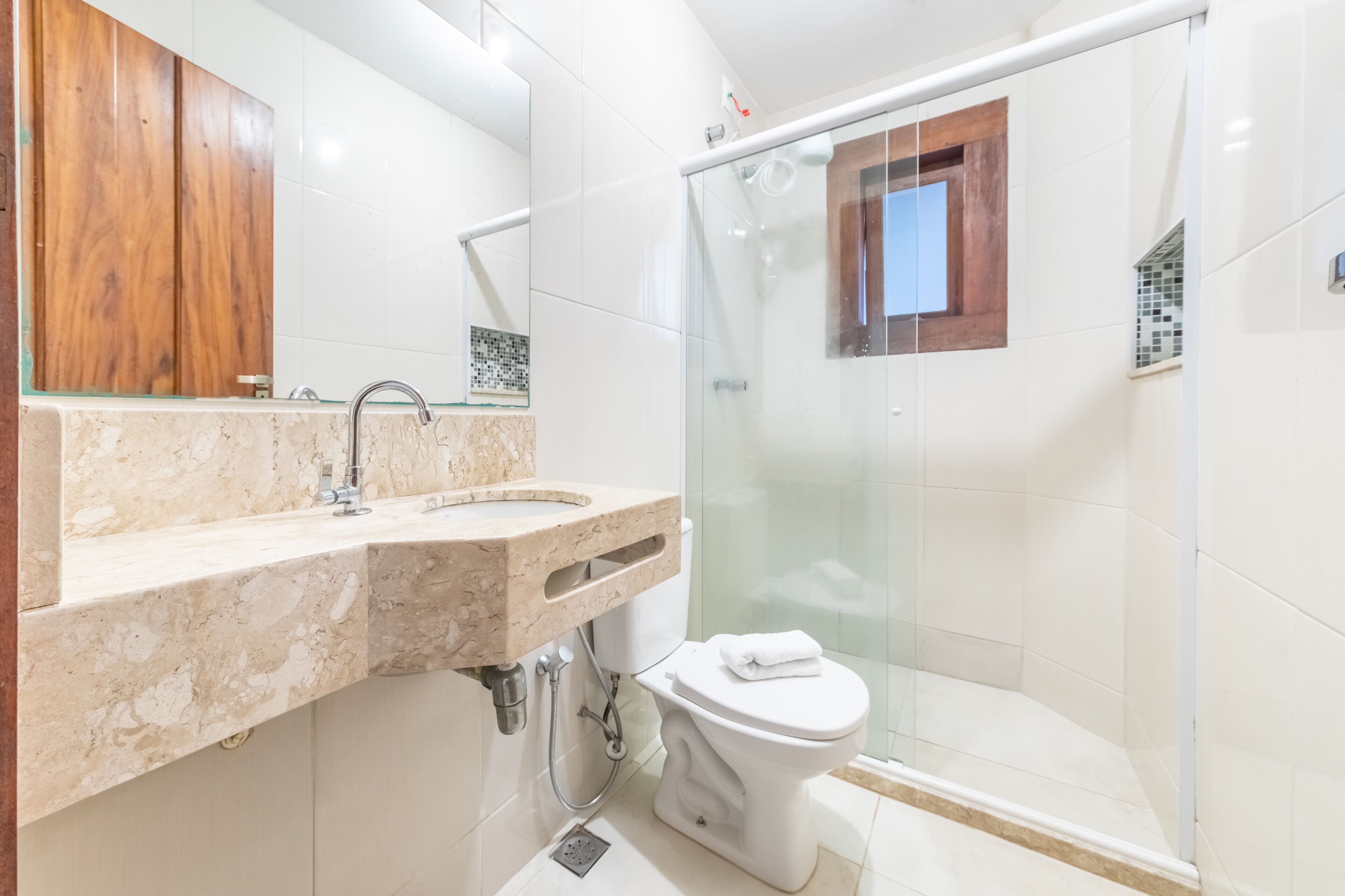 standard quadruple room | bathroom | shower, towels, soap, toilet paper